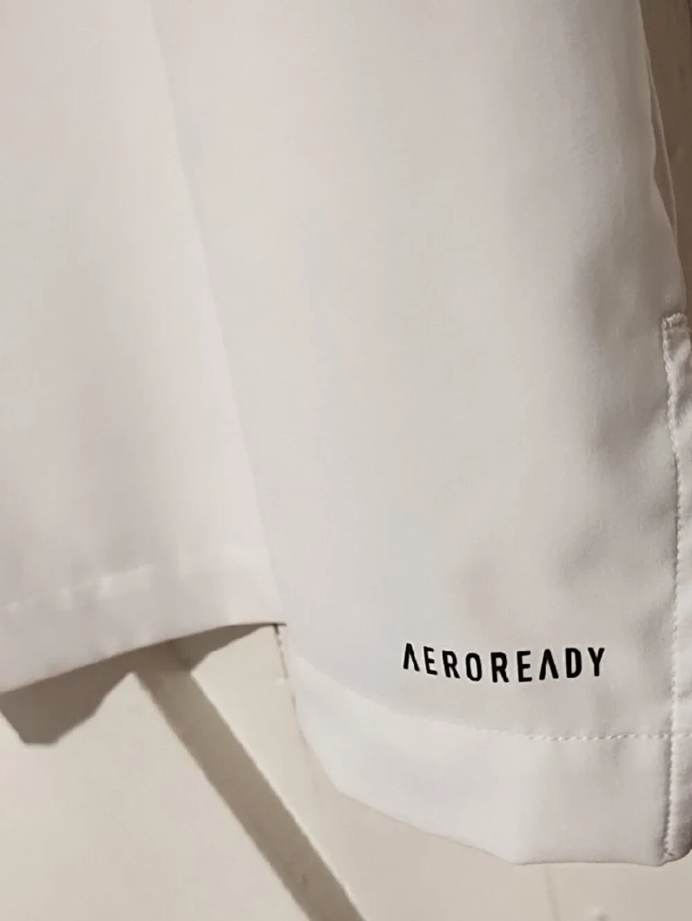 adidas EUC Medium AeroReady White Short-Sleeve Button Shirt with Black Logo.